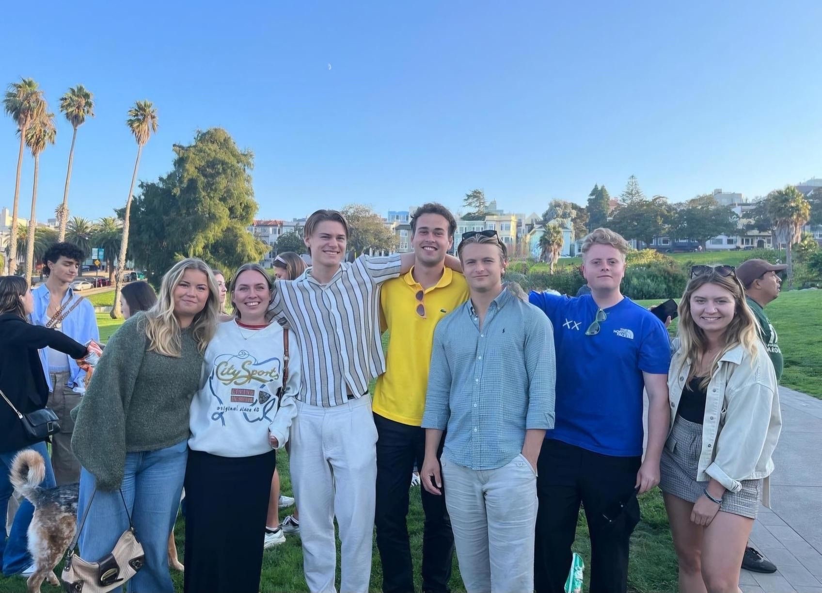 7 people standing in Dolores Park